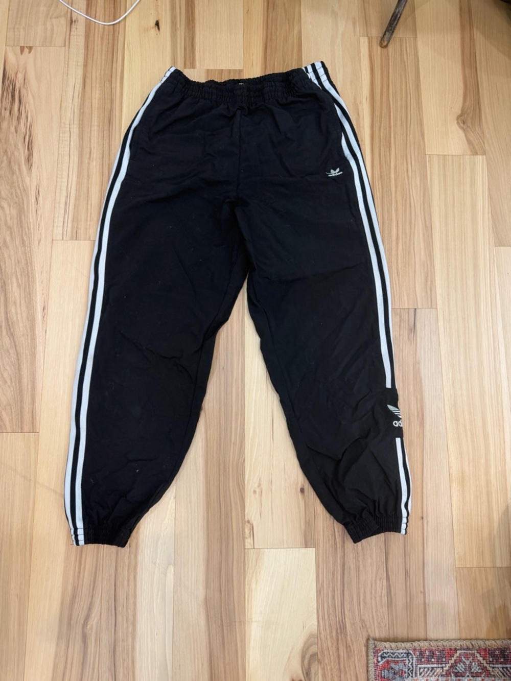 Adidas black track pants with white stripes Size M #athleisure